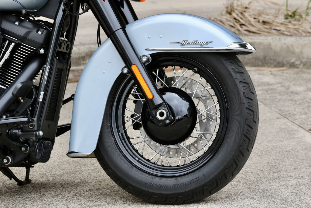 Hub cap evokes a drum brake look on the right side
