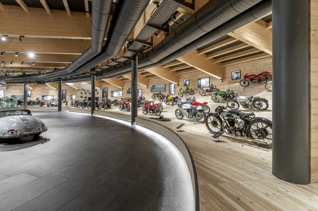 Many of the older bikes are displayed on a dummy board track